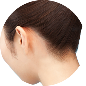 Back view of a woman's head showing smooth, natural-looking hair color